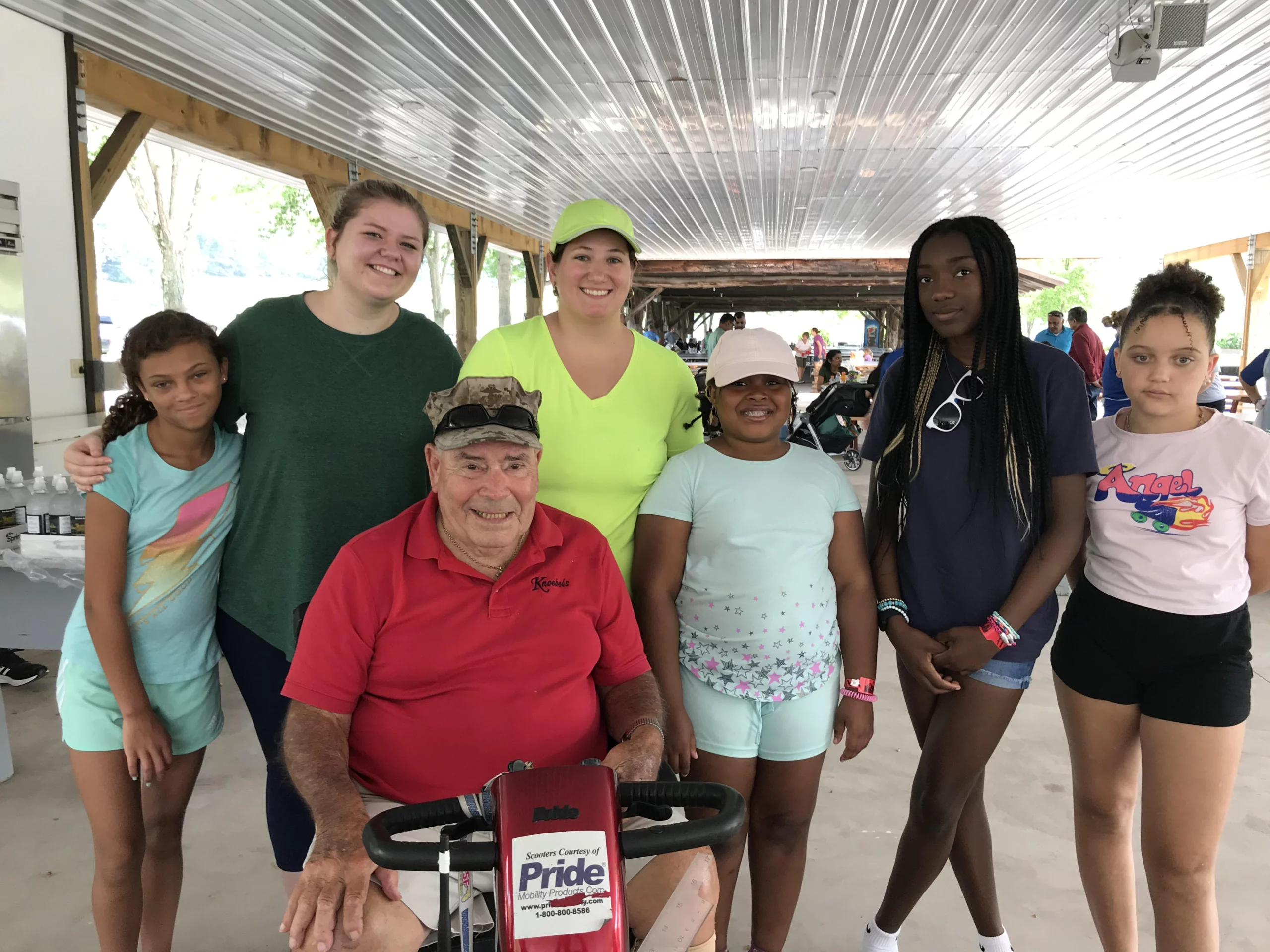 Man with group of children and adults from Masonic Children's Home.
