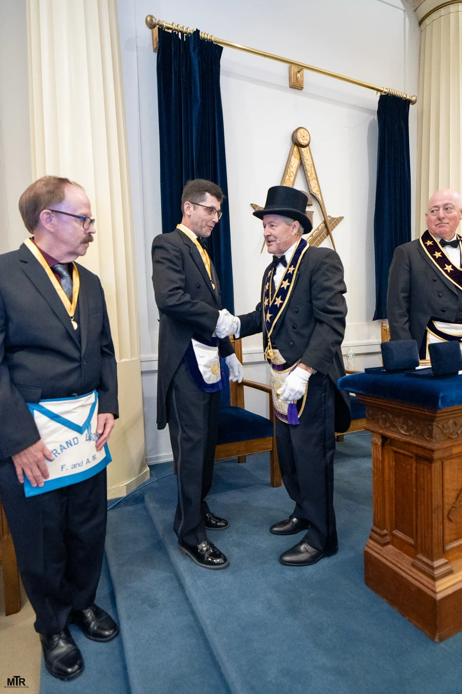 DSC06617 Grand Master Larry Derr shaking hands with another Mason.