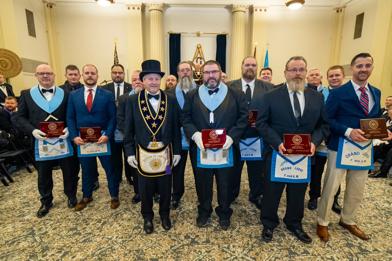 DSC06639 Mr. Derr with group of Masons holding awards.