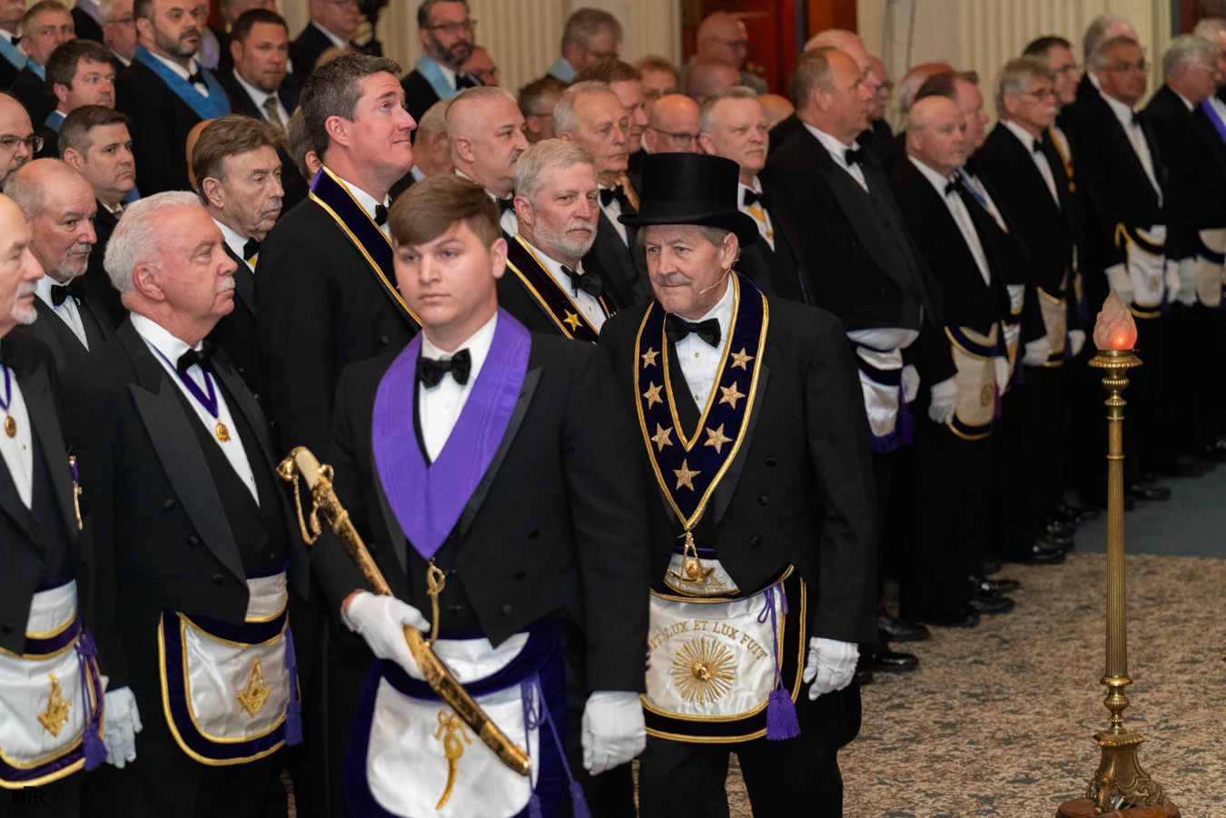 _DSC9993 Grand Master Larry Derr walking in front of group of Masons.