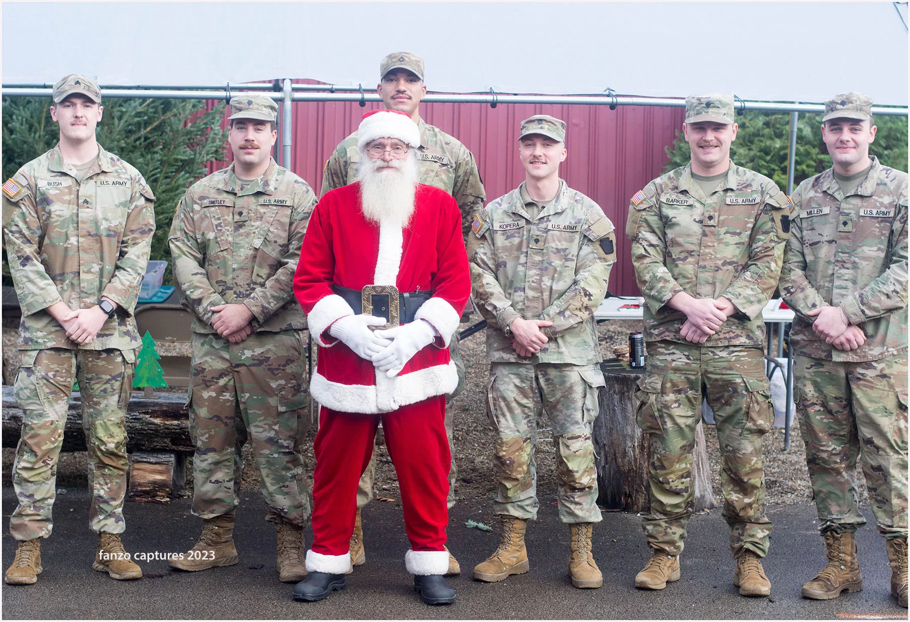 image-80effca10eb5e443443f87435bf15d2e Group of men dressed in military uniform standing with Santa.