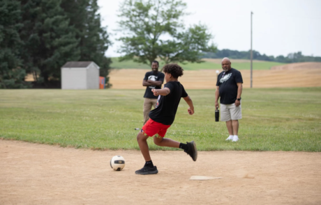 2V9A1336 Boy playing kickball.