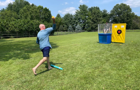 IMG_5398 Man throwing ball at dunk tank.