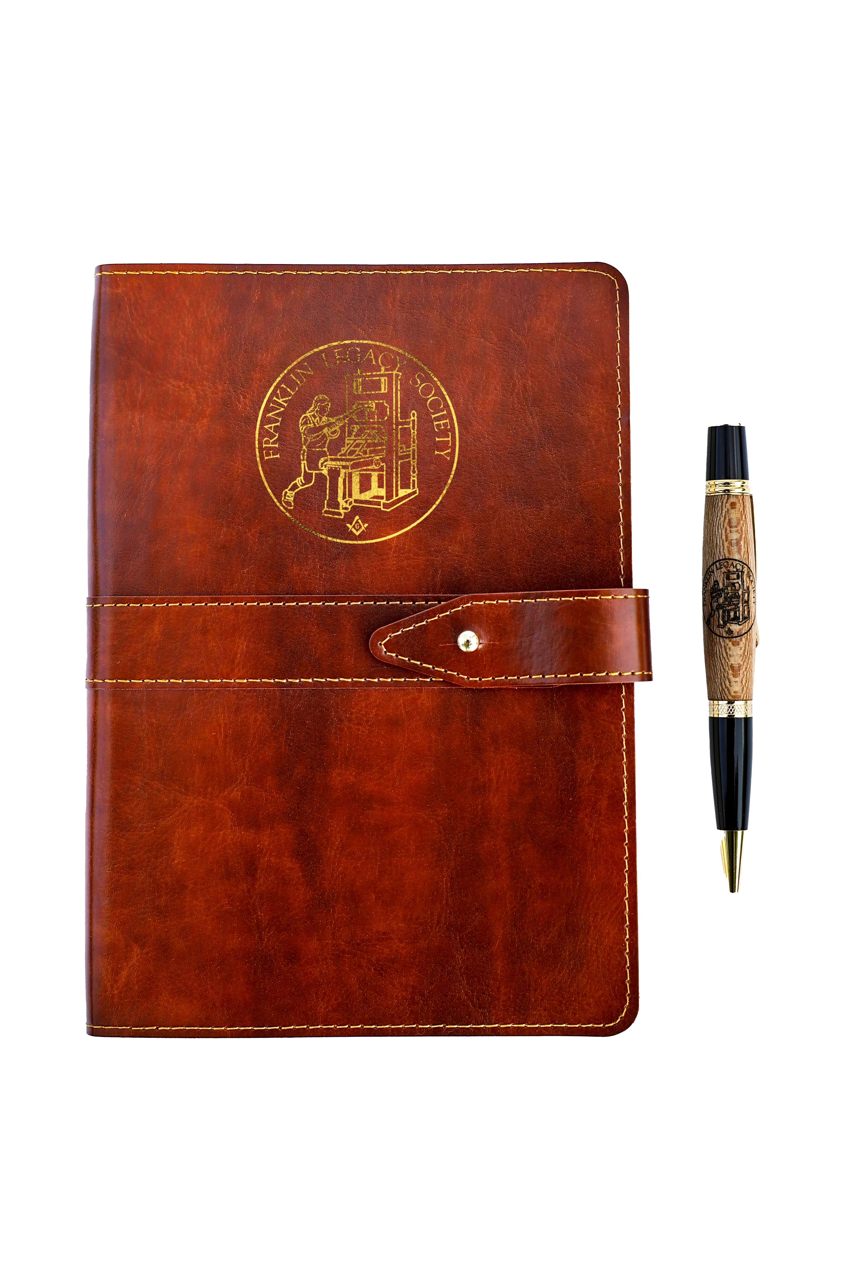 Brown journal with Franklin Legacy Society logo and pen next to it