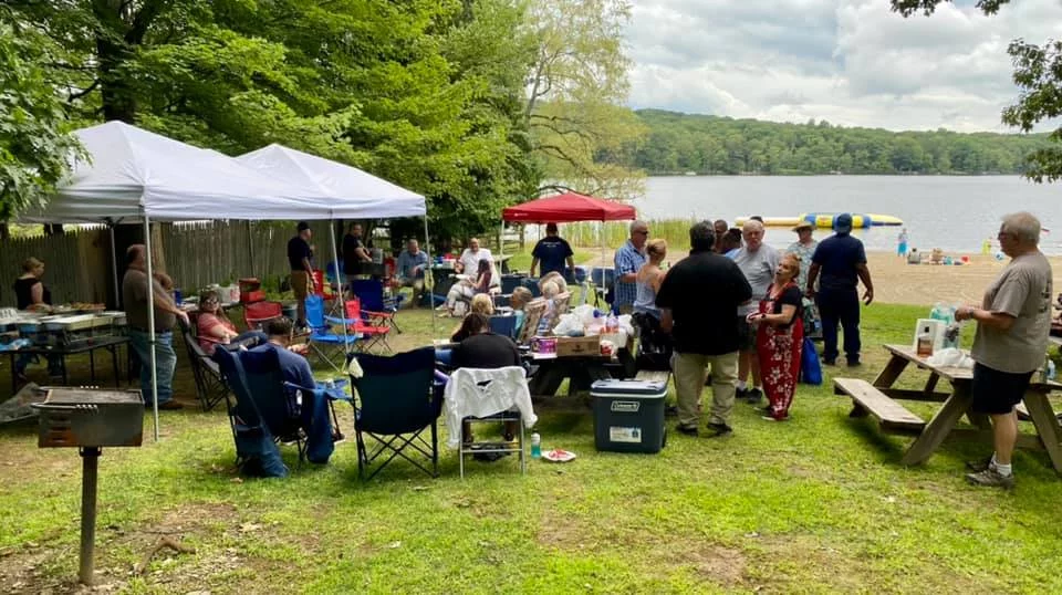 Milford Masonic lodge annual summer picnic 2021 Large group having picnic outdoors.