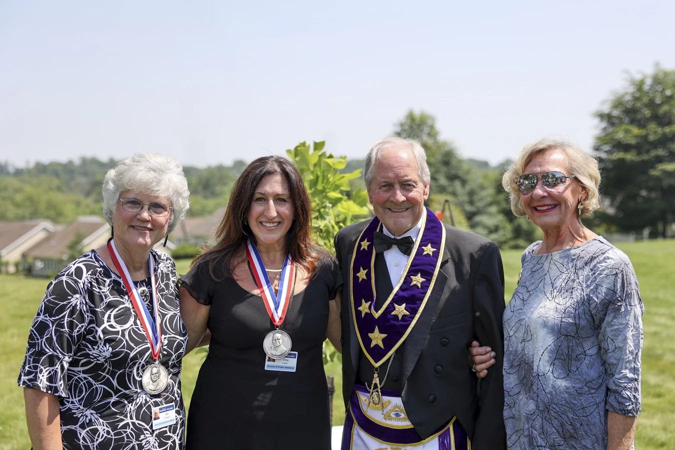 1W8A0740 Group of award recipients posed with Grand Master Larry Derr and his wife.