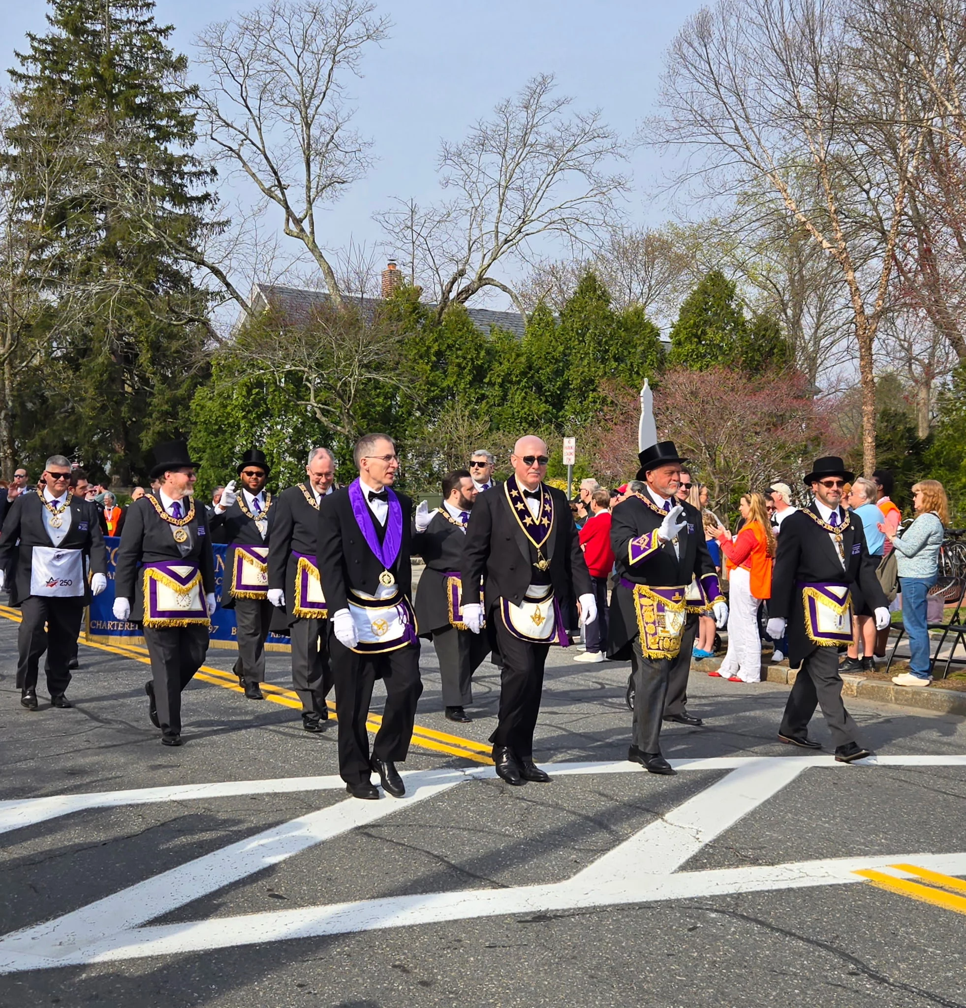 Masons walking in parade.
