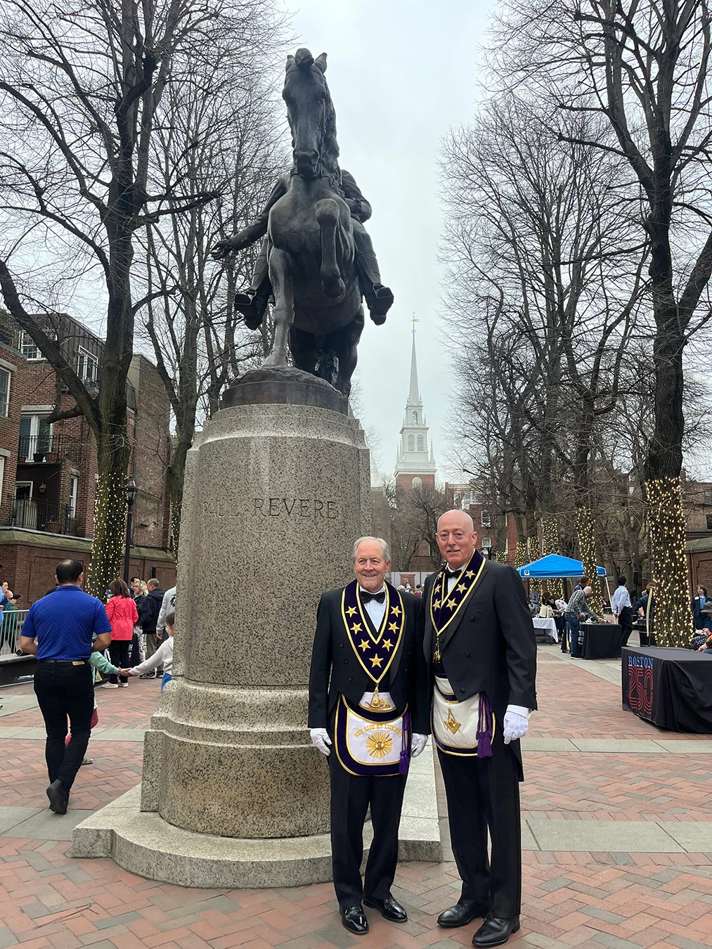 Grand Master Larry A. Derr and Deputy Grand Master Robert D. Brink in front of the Paul Revere statue in Boston.