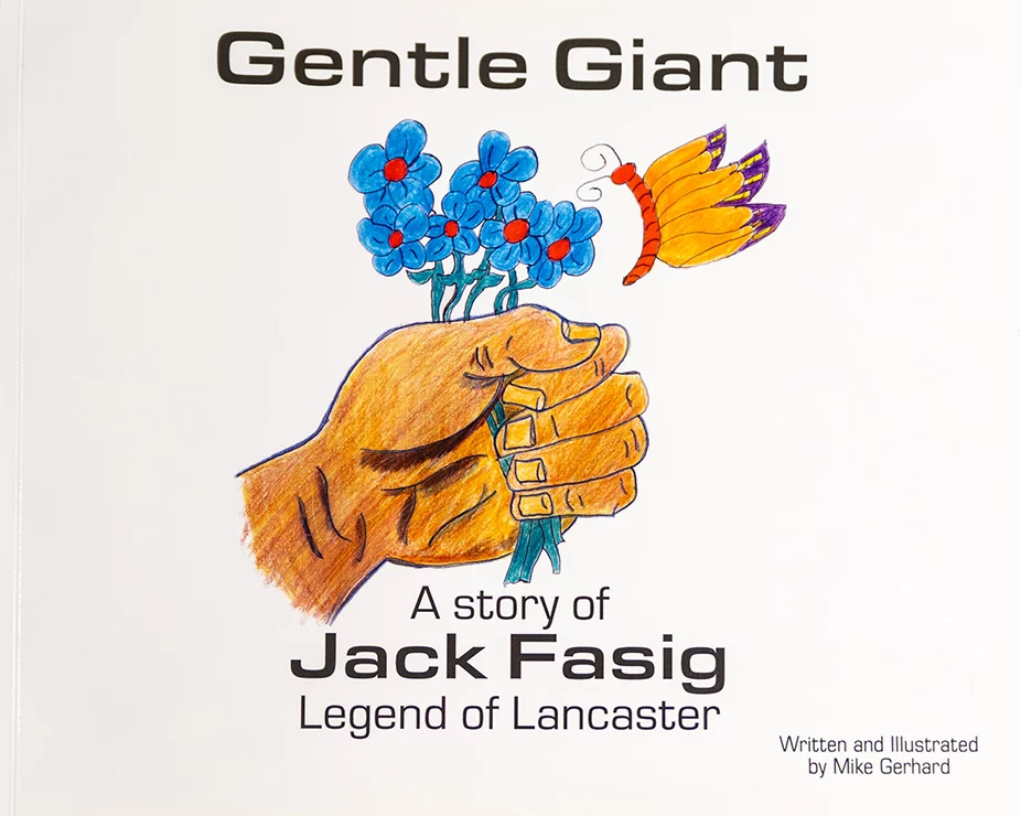 Book cover of Gentle Giant featuring a hand holding flowers and a butterfly landing on it.