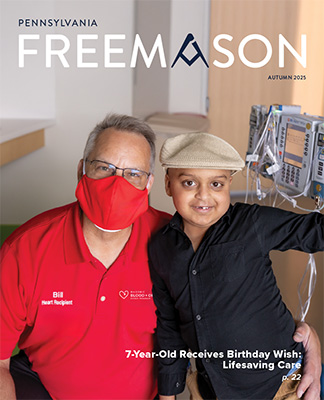 Autumn Freemason Cover featuring man in mask hugging smiling boy