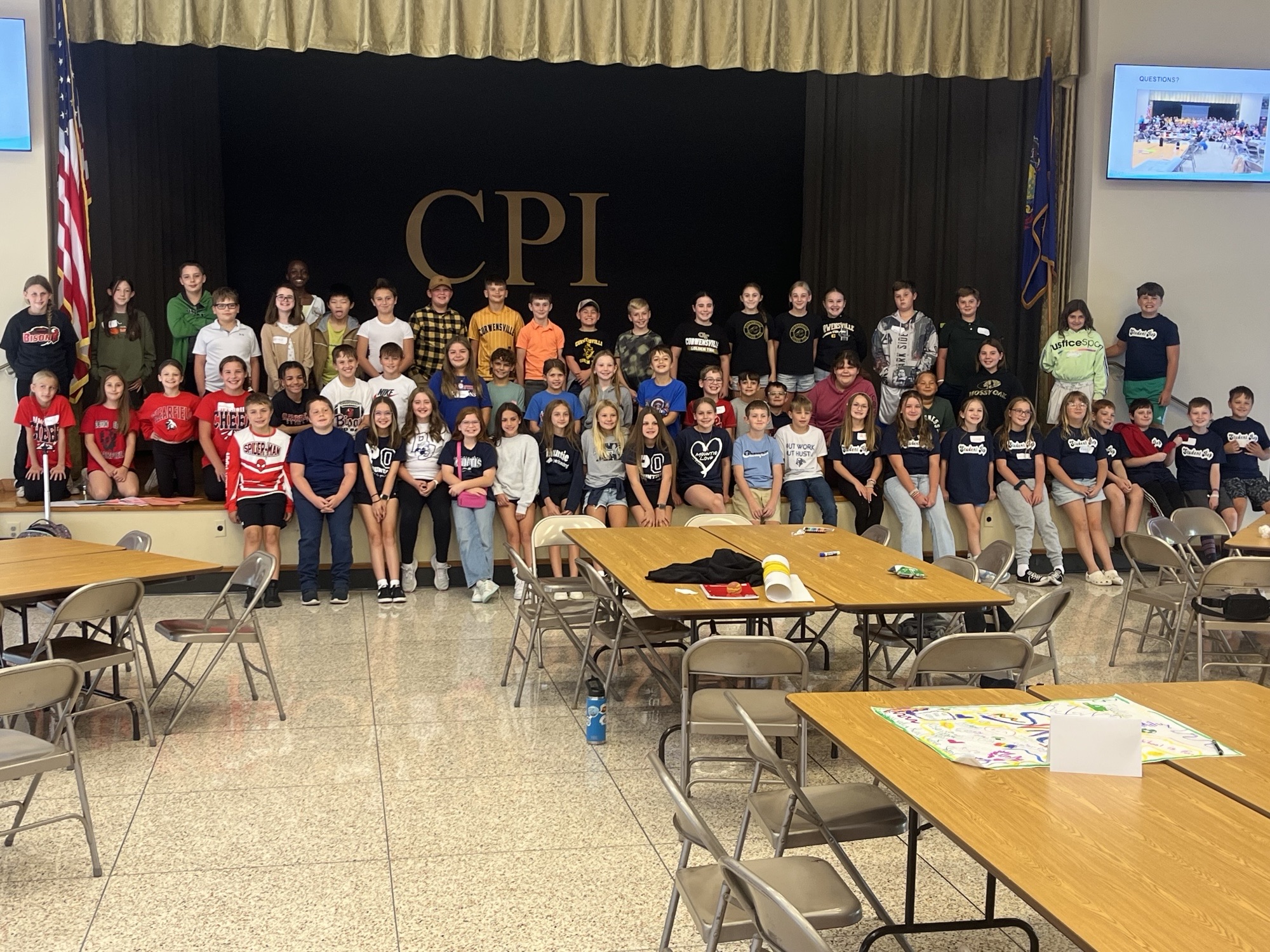 PMYF IU 10 Bullying Prevention Program Group of smiling children in auditorium.