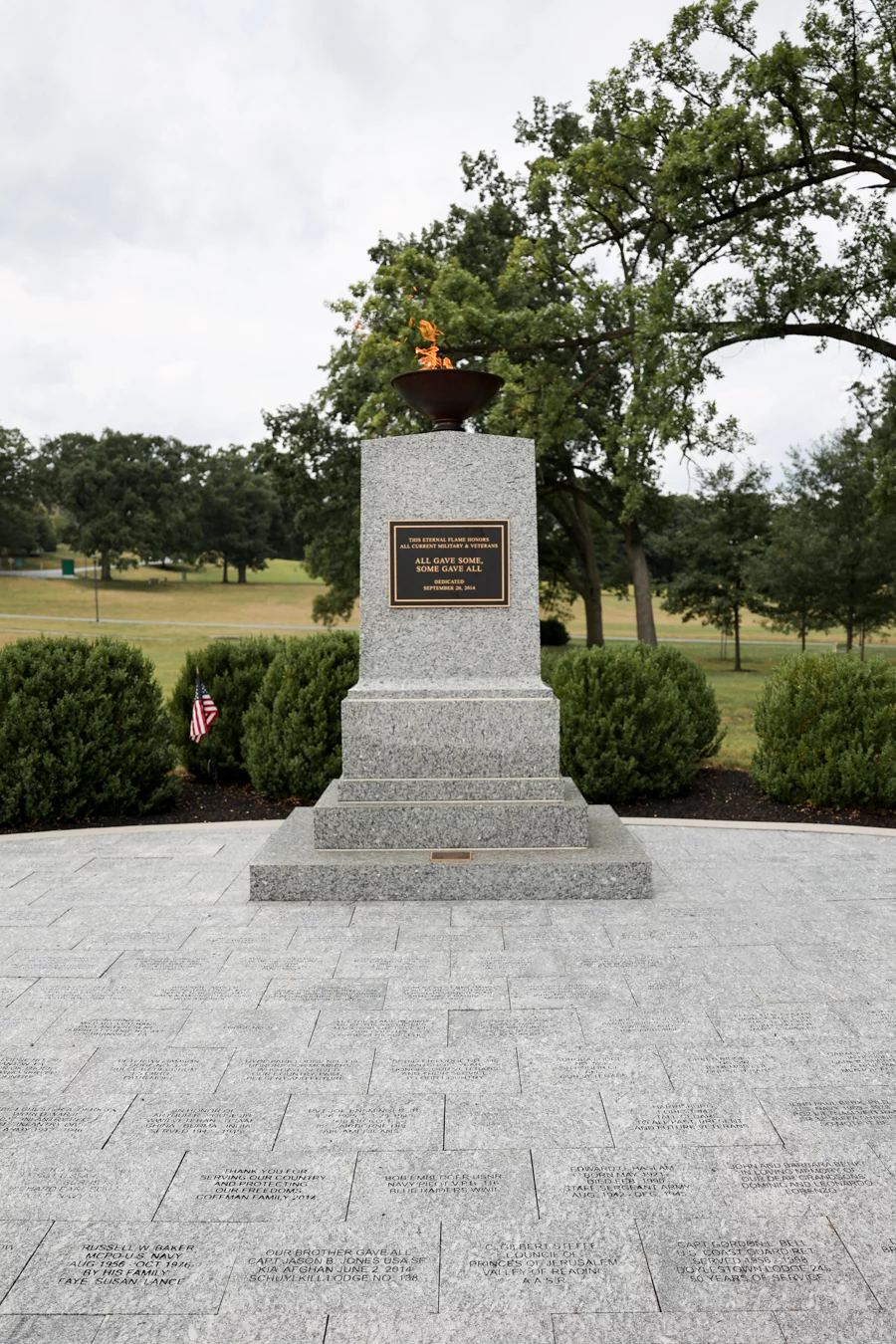Eternal Flame on marble memorial.