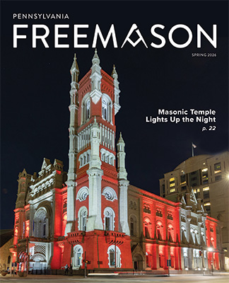 Spring 2026 Freemason cover featuring the Masonic Temple lit up in red and white.