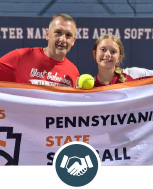 Man and girl holding up a banner with hands shaking logo.