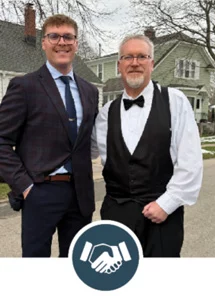 Navigate to "Membership" in this issue. Icon shows two smiling men standing outdoors with graphic of hands shaking overlaid on it.