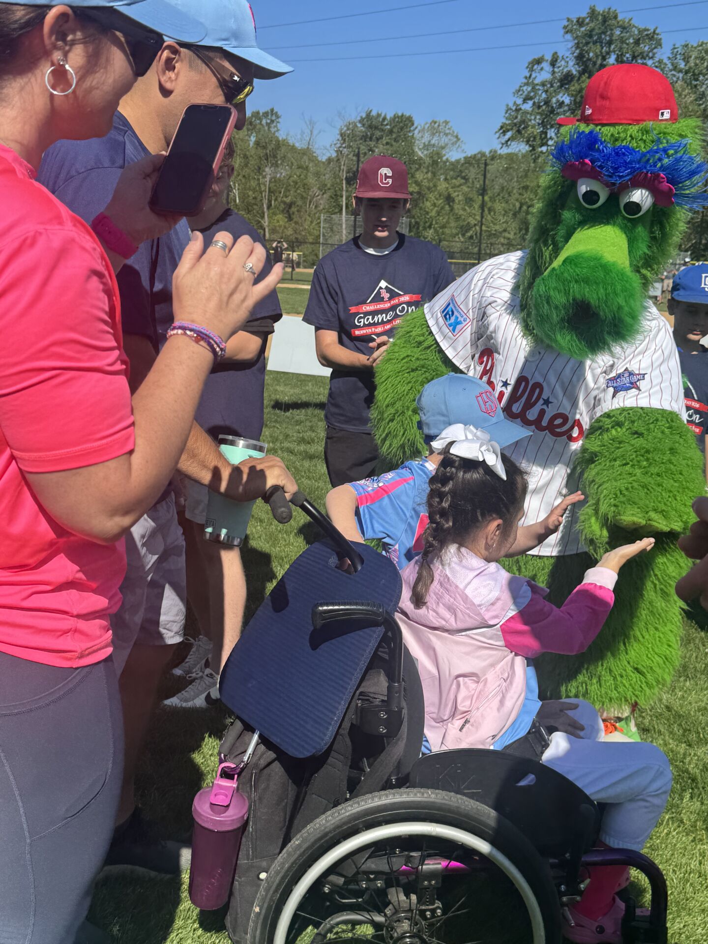 IMG_5476 Parents taking pictures as children interact with the Phillie Phanatic.